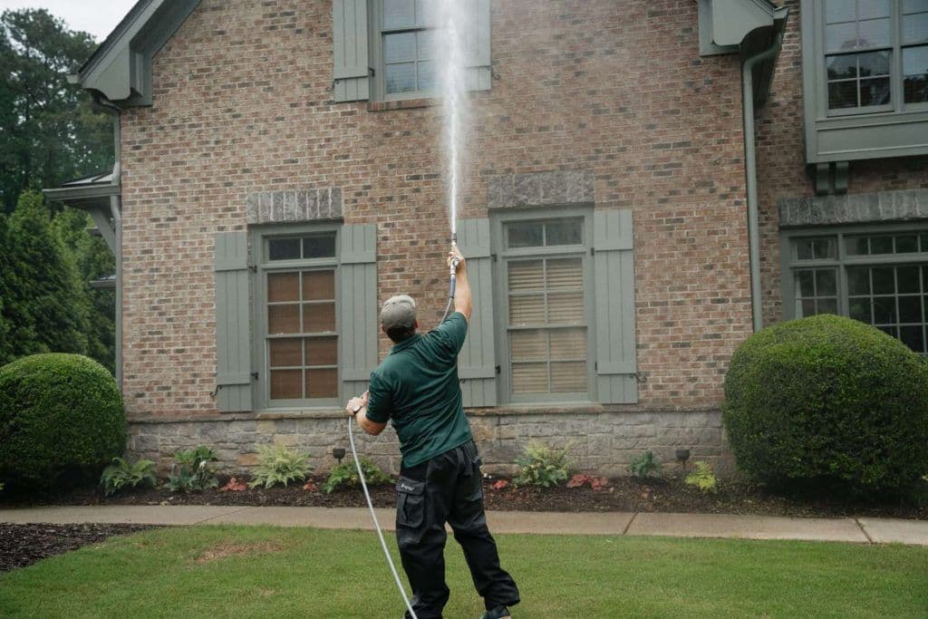 Jordan from Horizon Hygiene washing a home in Brookhaven