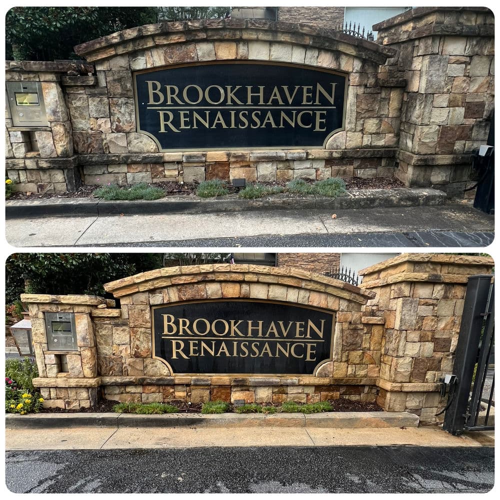 Entrance sign for Brookhaven Renaissance with stone architecture and landscaping details.