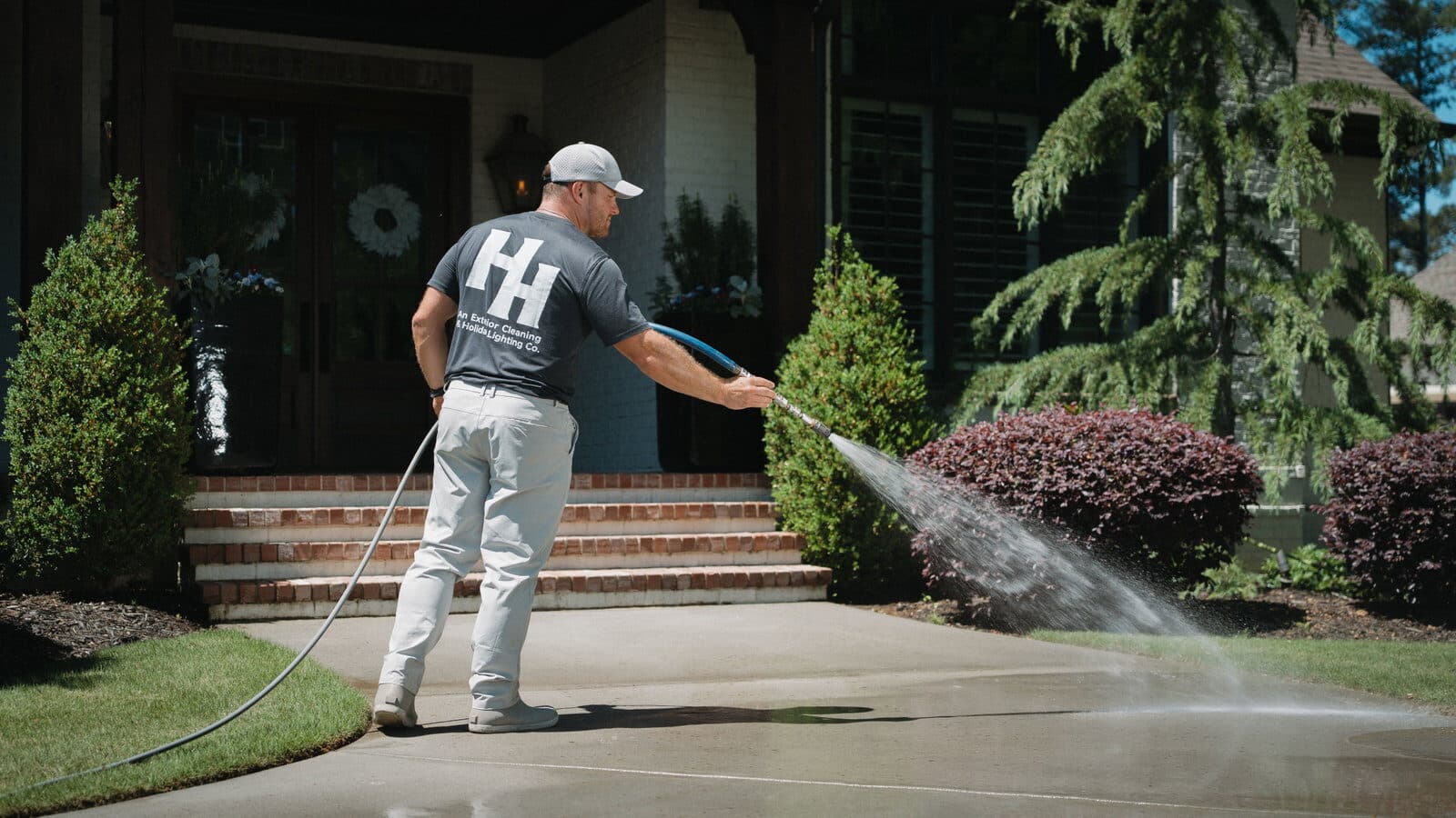 Rinsing an entryway and front steps