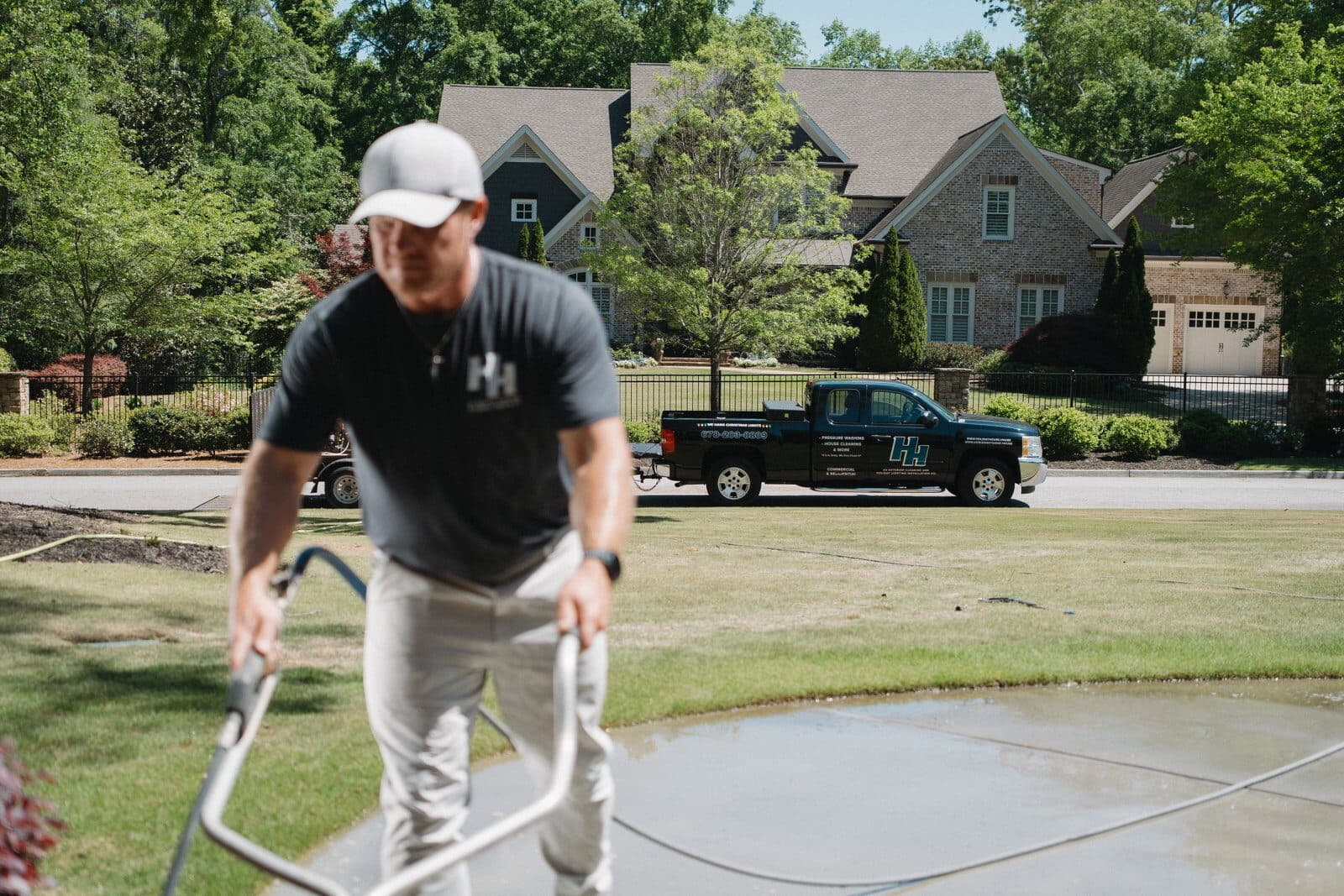 Surface cleaning a concrete driveway up close