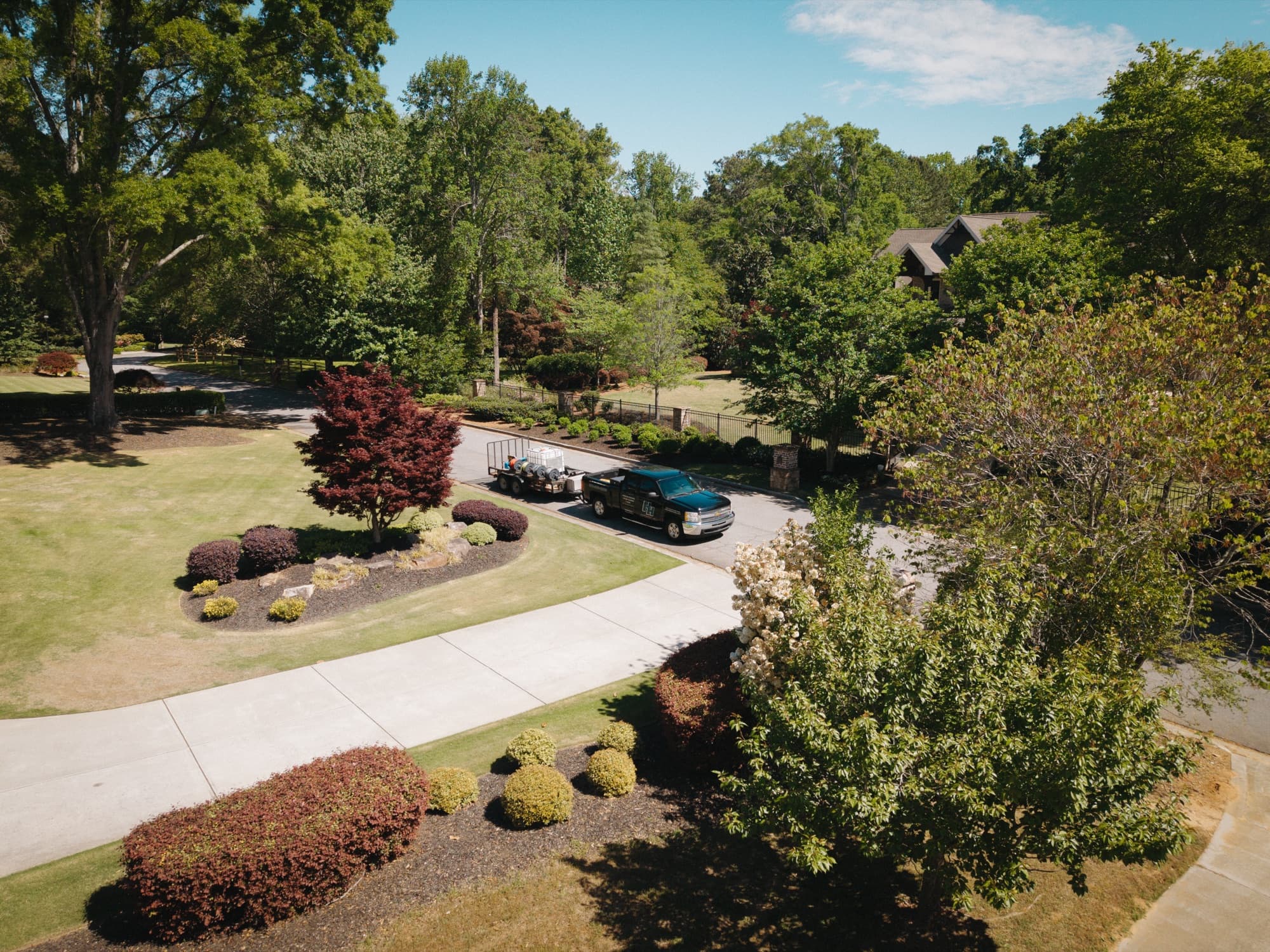 Aerial view of the Horizon Hygiene truck parked in a client's driveway